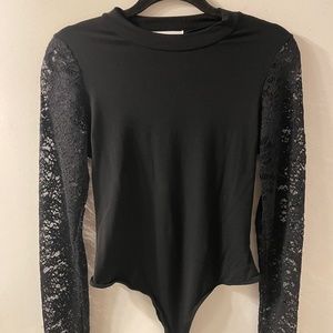 Lace sleeved bodysuit